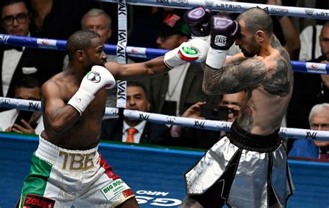 Floyd Mayweather Jr. vs. John Gotti III live results: Fight card highlights.